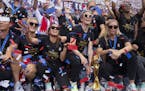 Members of the World Cup-winning U.S. women&#x2019;s national soccer team at City Hall after their celebratory parade in New York, July 10, 2019. The 