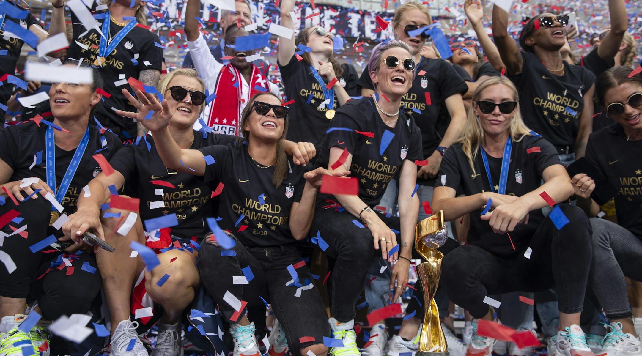 Members of the World Cup-winning U.S. women’s national soccer team at City Hall after their celebratory parade in New York, July 10, 2019. The sports and talent agency Wasserman, which represents more than half the members of the team, including Megan Rapinoe and Alex Morgan, will launch a division solely focused on female athletes. (Calla Kessler/The New York Times)