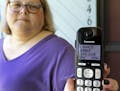 In this Tuesday, Aug. 1, 2017, photo, Jen Vargas shows the data of a recent robocall on her home phone in Orlando, Fla. Vargas has an app for her cell