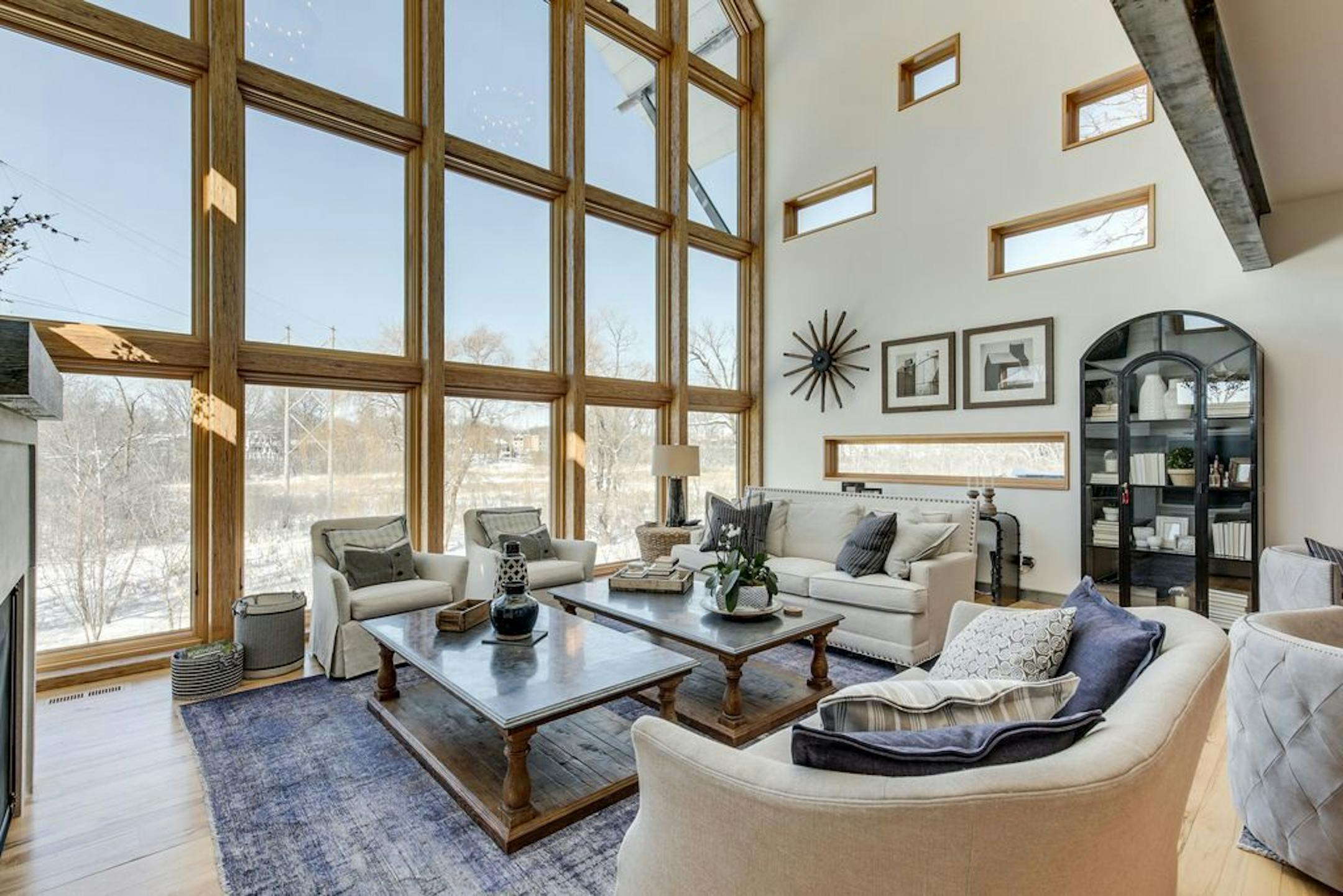 The living room with its wall of windows.