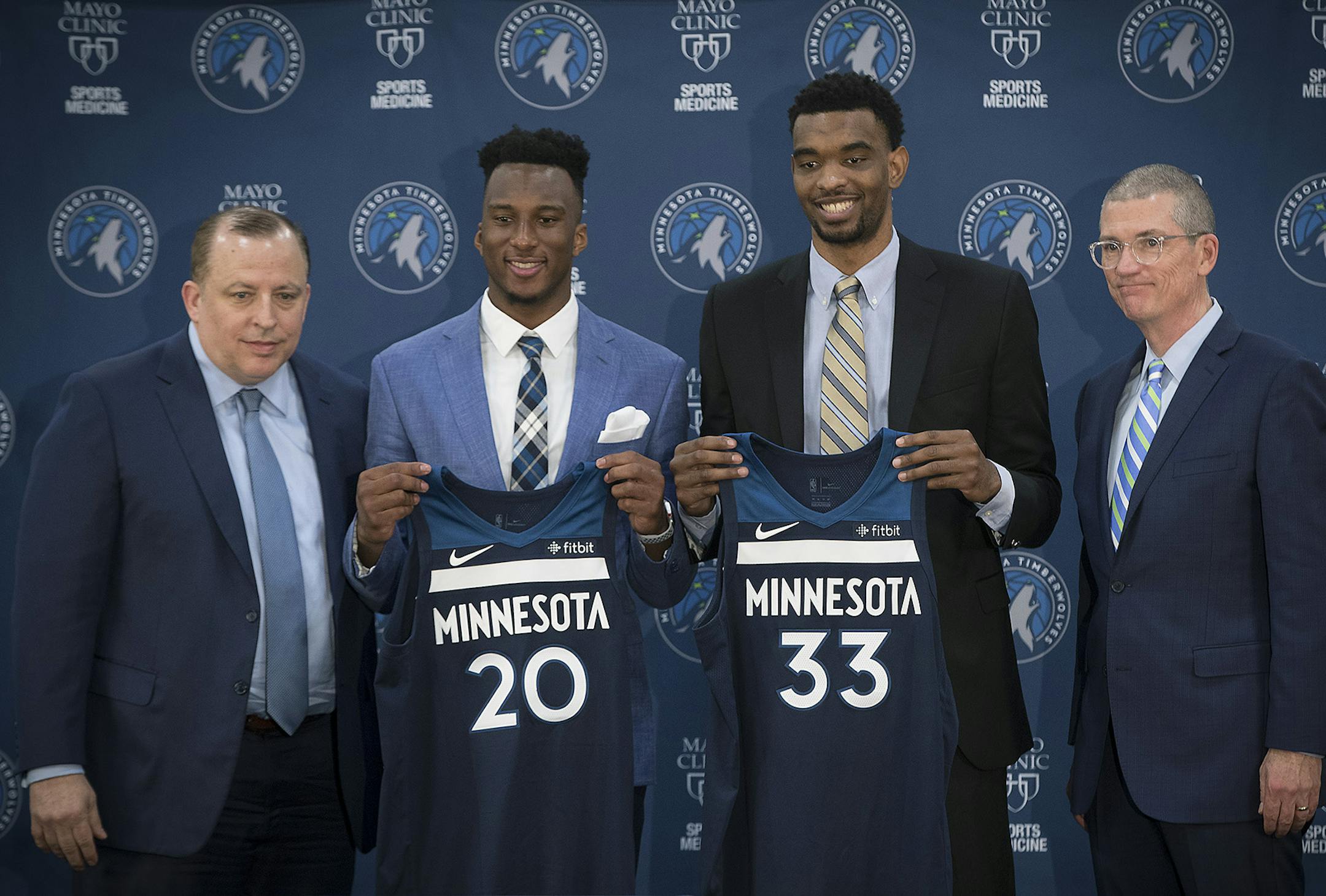 The Minnesota Timberwolves, including head coach Tom Thibodeau, left, and general manager Scott Layden, right, introduce the team's 2018 draft picks No. 20 Josh Okogie (20th overall), and No. 33 Keita Bates-Diop (48th overall) during a news conference on Tuesday, June 26, 2018, at the Mayo Clinic Square in Minneapolis. (Elizabeth Flores/Minneapolis Star Tribune/TNS)
