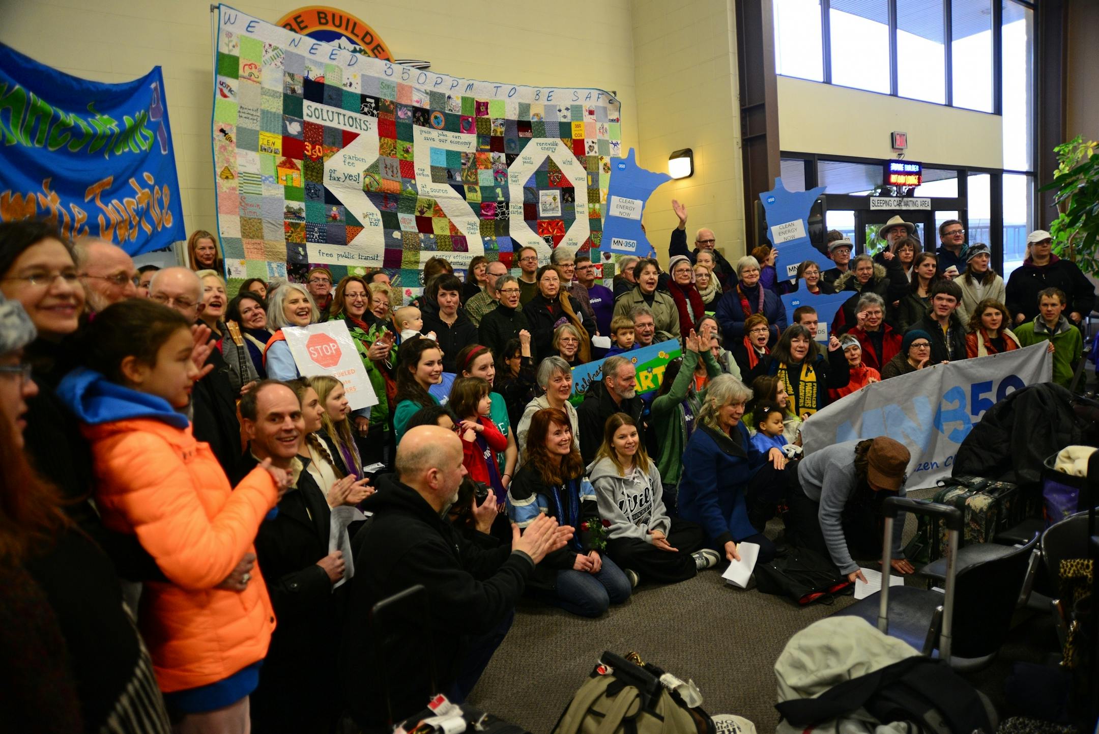 A flash mob-style sendoff was held in the Amtrak depot in St Paul, with musicians, author Louise Erdrich, storyteller Kevin Kling and environmental leaders as 72 Minnesotans board Amtrak's "Earth Train" to Washington, D.C., to join "Forward on Climate," a rally against global warming.