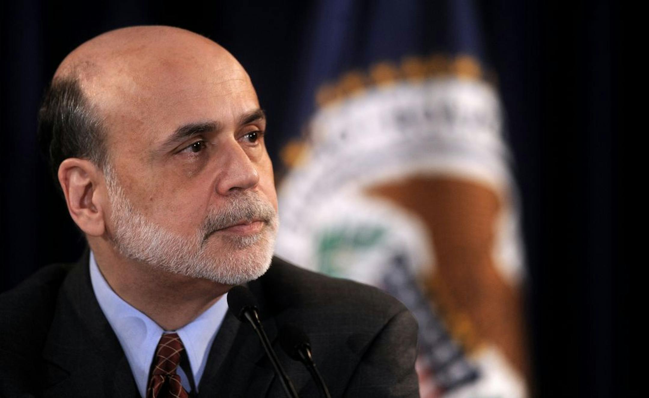 Federal Reserve Chairman Ben Bernanke said threatening to block an increase in the debt limit to gain deeper federal spending cuts could backfire and worsen the economy.