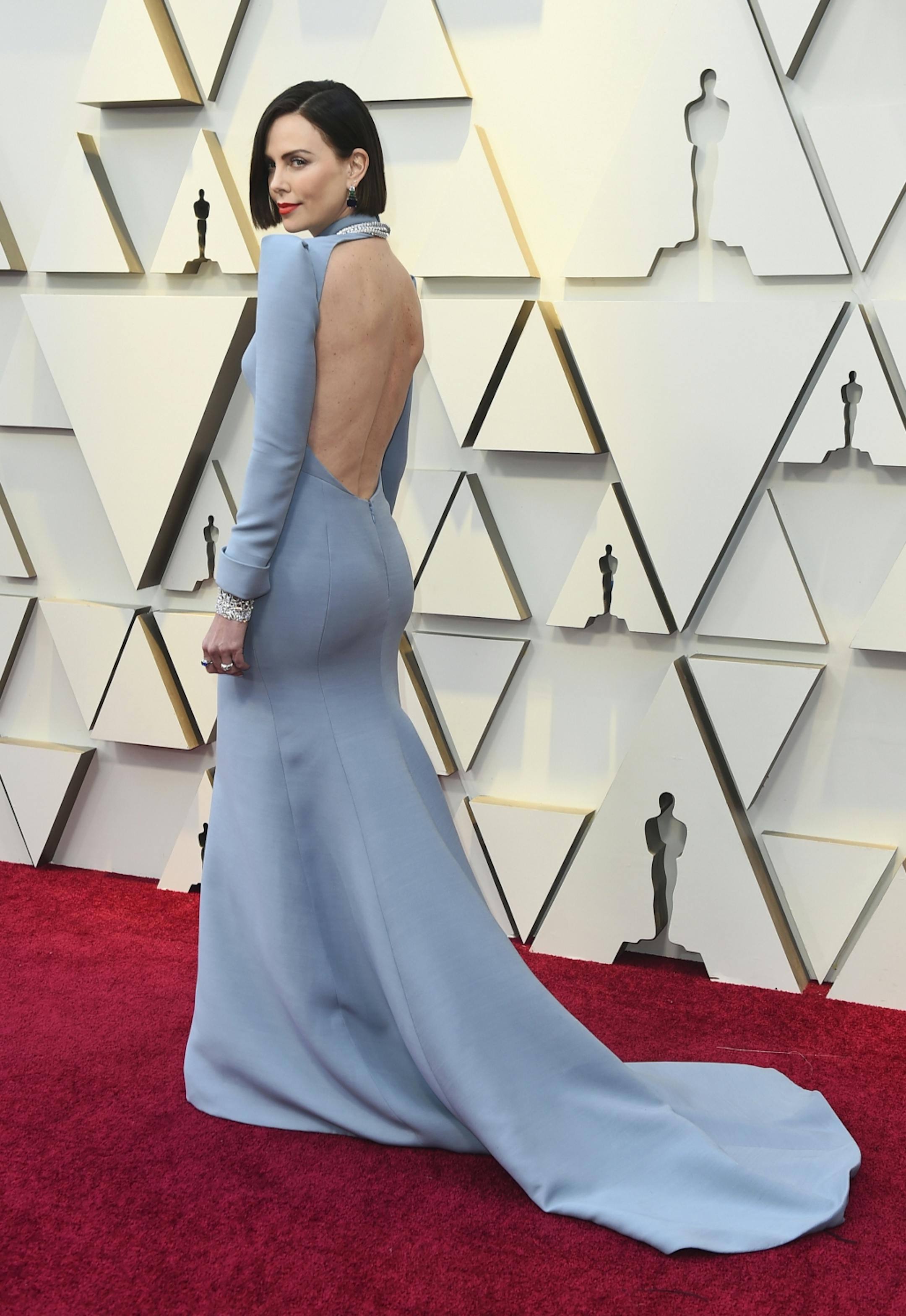 Charlize Theron arrives at the Oscars on Sunday, Feb. 24, 2019, at the Dolby Theatre in Los Angeles.