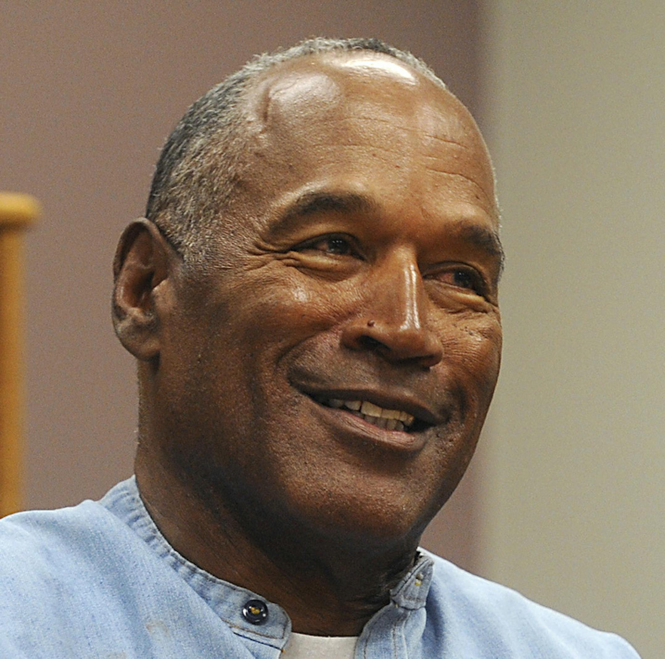 FILE - In this July 20, 2017 file photo, former NFL football star O.J. Simpson attends his parole hearing at the Lovelock Correctional Center in Lovelock, Nev. Fox TV says it will air an O.J. Simpson special including an unseen 2006 interview in which he theorizes about what happened the night his ex-wife was murdered. The two-hour special, with the provocative title "O.J. Simpson: The Lost Confession?" will air 8 p.m. EST Sunday, March 11. Soledad O'Brien is the host. (Jason Bean/The Reno Gazet