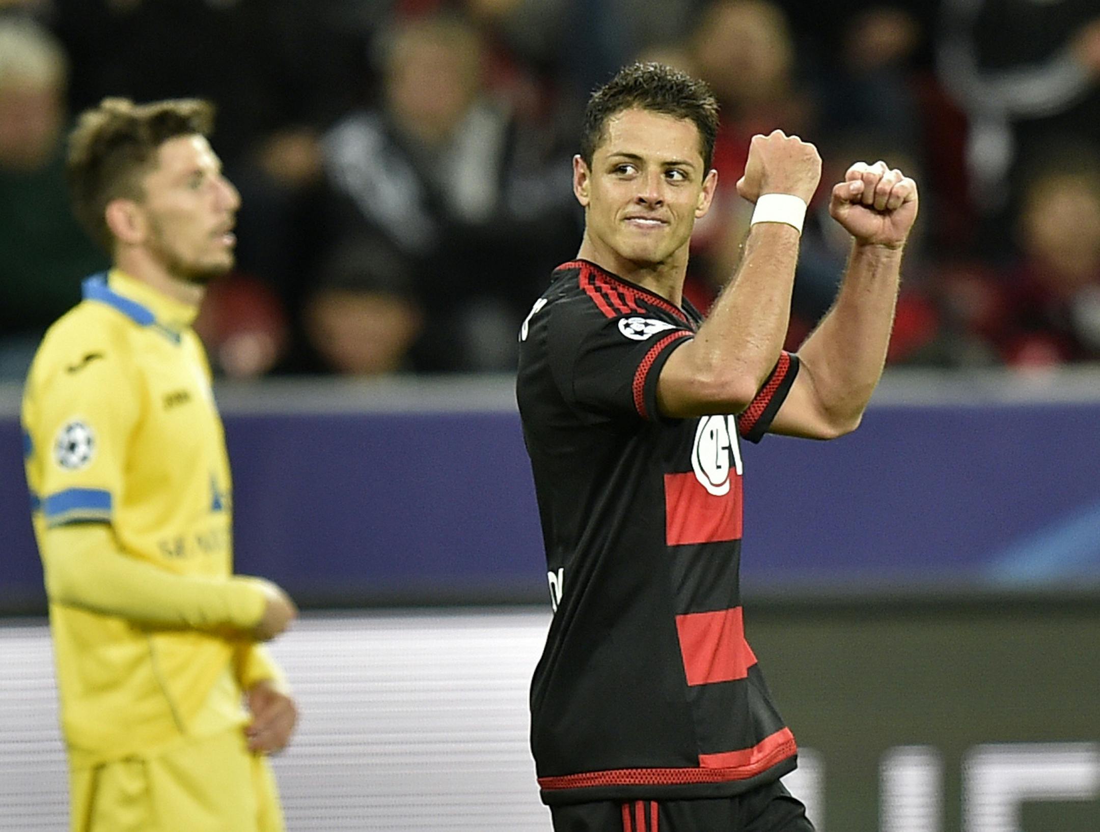 Leverkusenís Javier Hernandez of Mexico celebrates after scoring his first goal during the Champions League group E soccer match between Bayer Leverkusen and FC Bate Borisov in Leverkusen, Germany, Wednesday, Sept. 16, 2015. (AP Photo/Martin Meissner) ORG XMIT: amme101