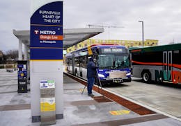 An Orange Line bus pulls up for a media tour in Burnsville's Heart of the City are in December 2021. The city's planning commission gave its OK to a p