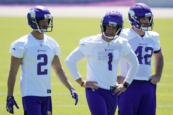 Minnesota Vikings kicker Greg Joseph (1) stood with punter Britton Colquitt (2) and long snapper Andrew DePaola (42) during the first day of mandatory