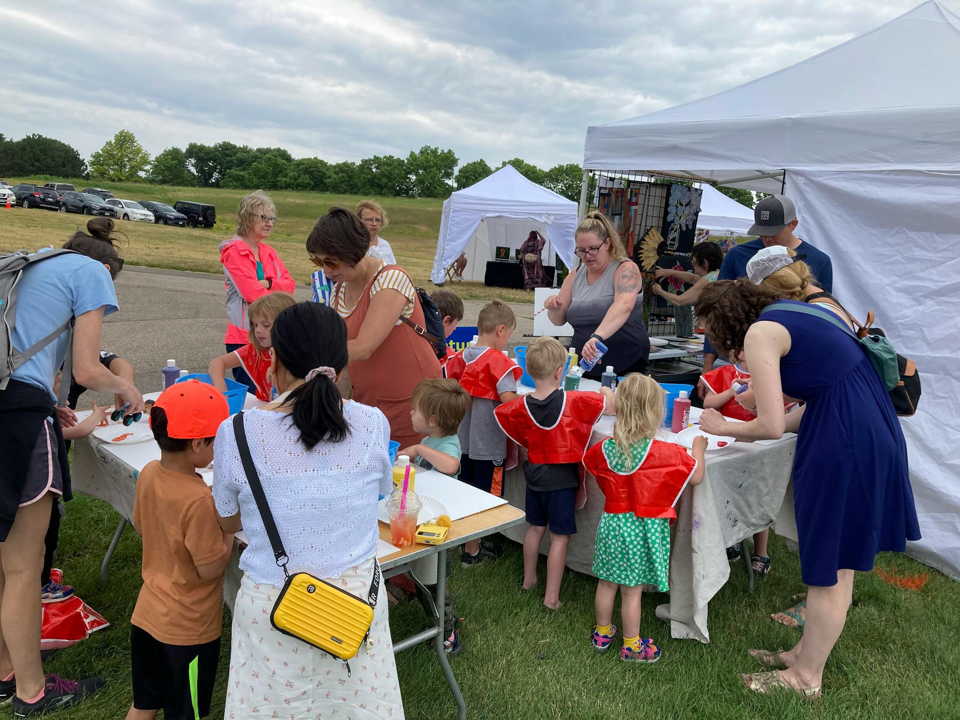 A 2023 artist demonstration by Kristine Cantey. Children learned to paint using everyday items and got to take home a canvas.