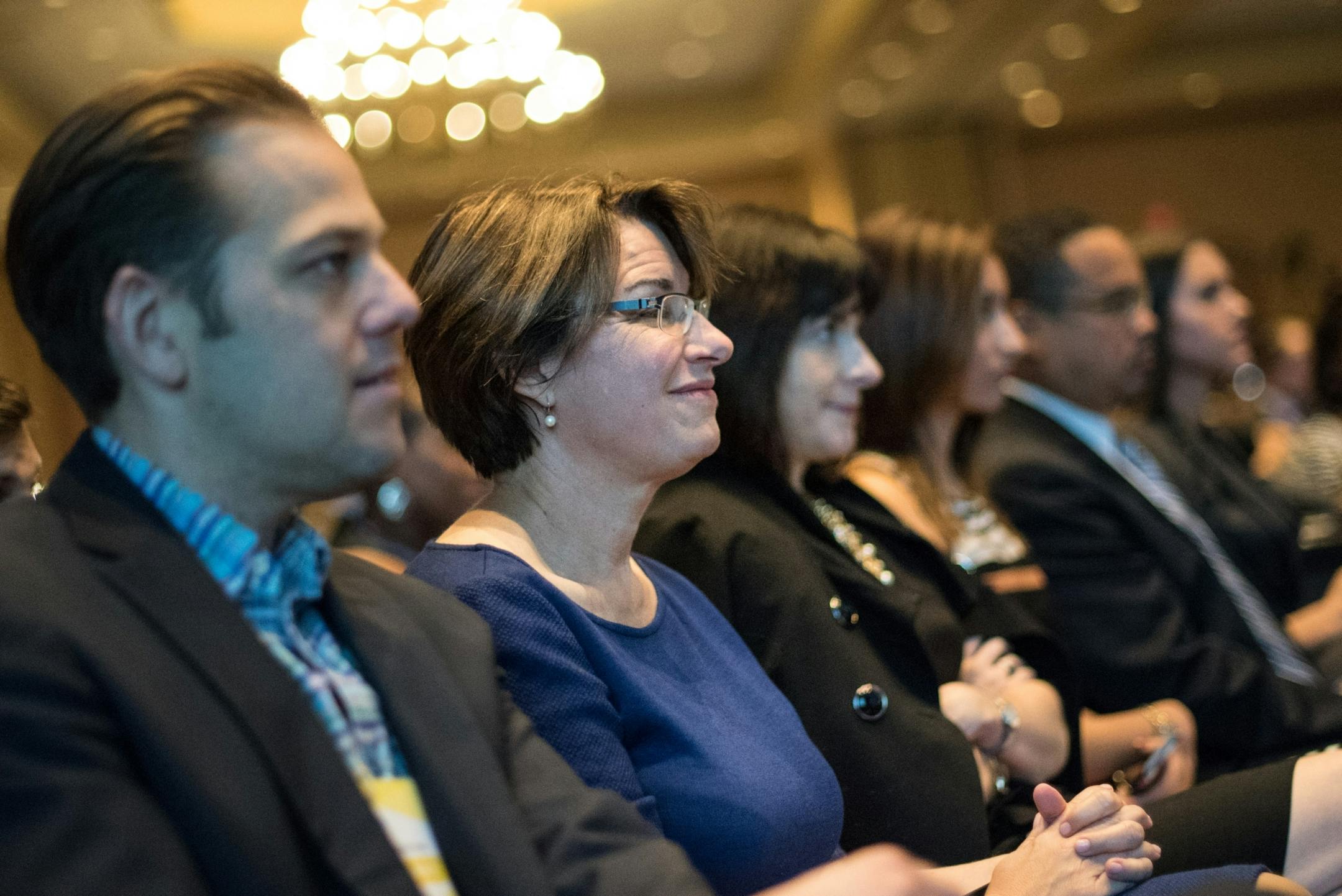Senator Amy Klobuchar listened as Hilary Clinton spoke at the DNC.