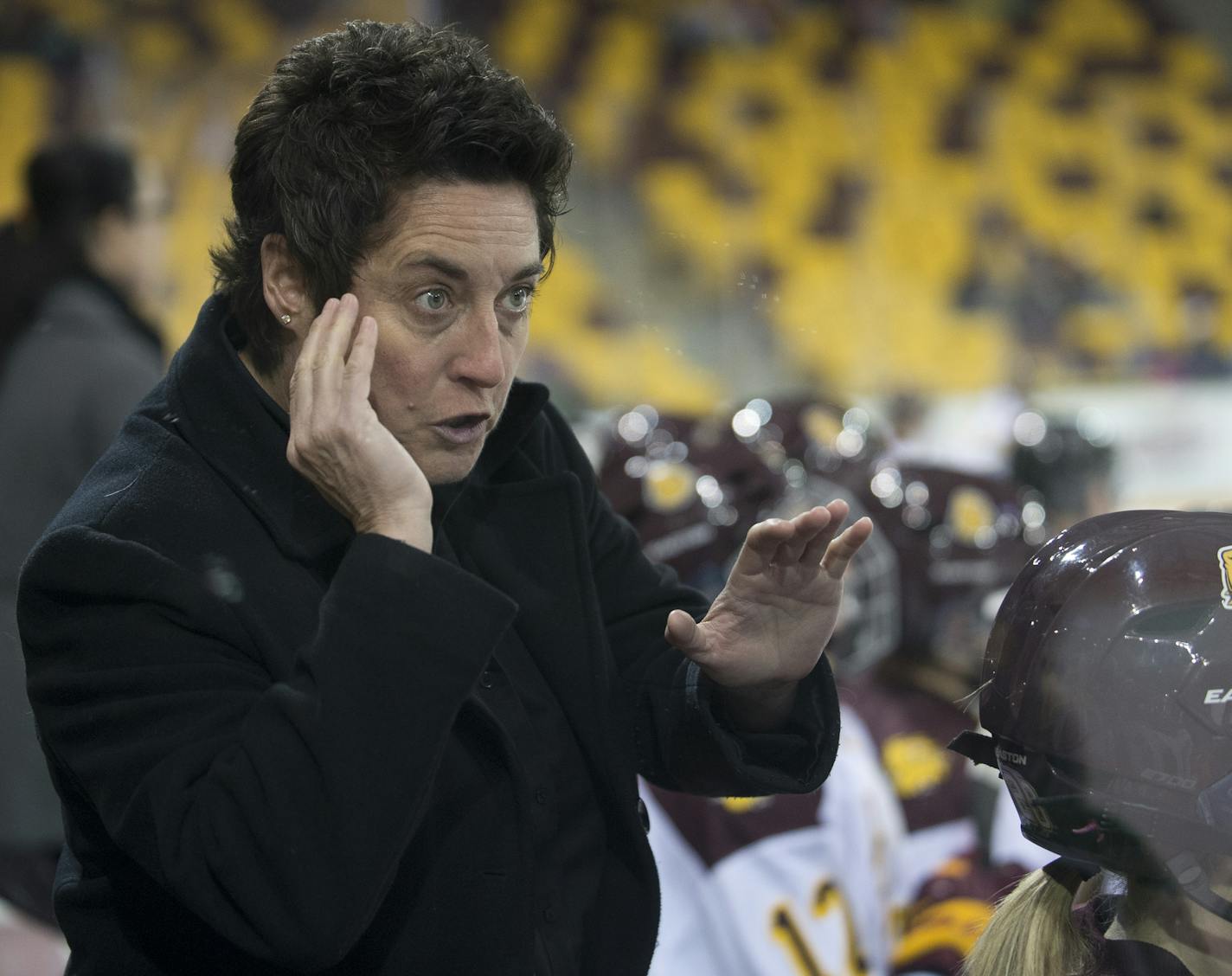 University of Minnesota Duluth head coach Shannon Miller shows intensity while instructing forward Demi Crossman during the first period of Saturday night's game. ] (Aaron Lavinsky | StarTribune) University of Minnesota Duluth told women's hockey head coach Shannon Miller that this season would be the las of her successful run as the Bulldog's coach. After five national championships, an NCAA record, and 11 Frozen Four Victories, Miller, the highest-paid coach in women's hockey, was told her con