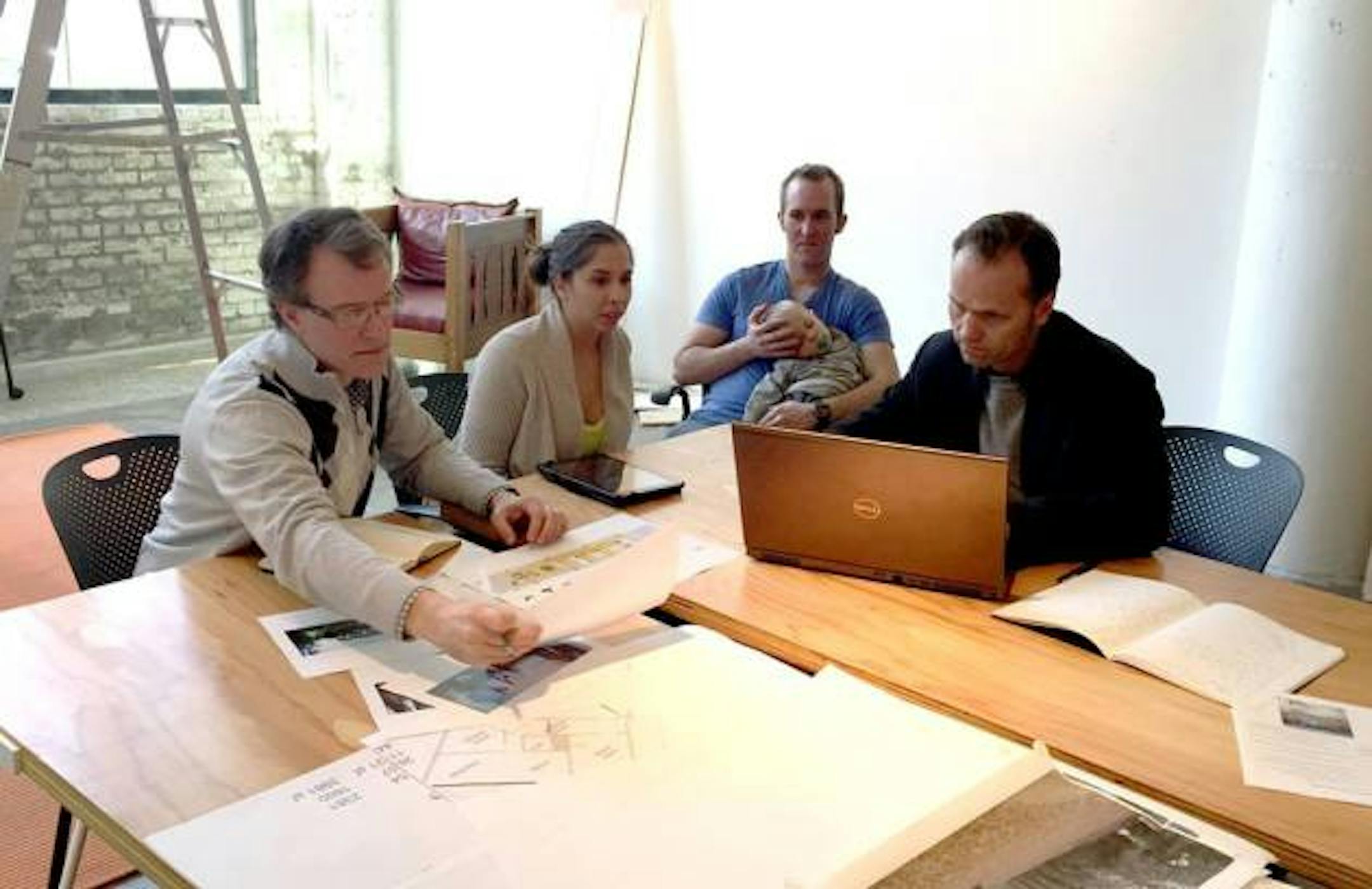 In early May, after the close of the show, the skyway will be moved to Brainerd Minnesota to become the home of Aimee and Preston Jobe, who are shown consulting with architects Bob Ganser and Ben Awes.