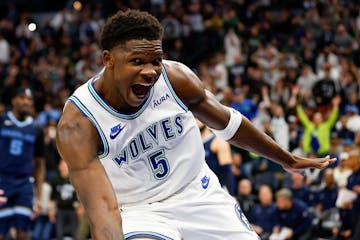 Timberwolves guard Anthony Edwards celebrates his dunk in the third quarter of the Wolves' victory over the Memphis Grizzlies.