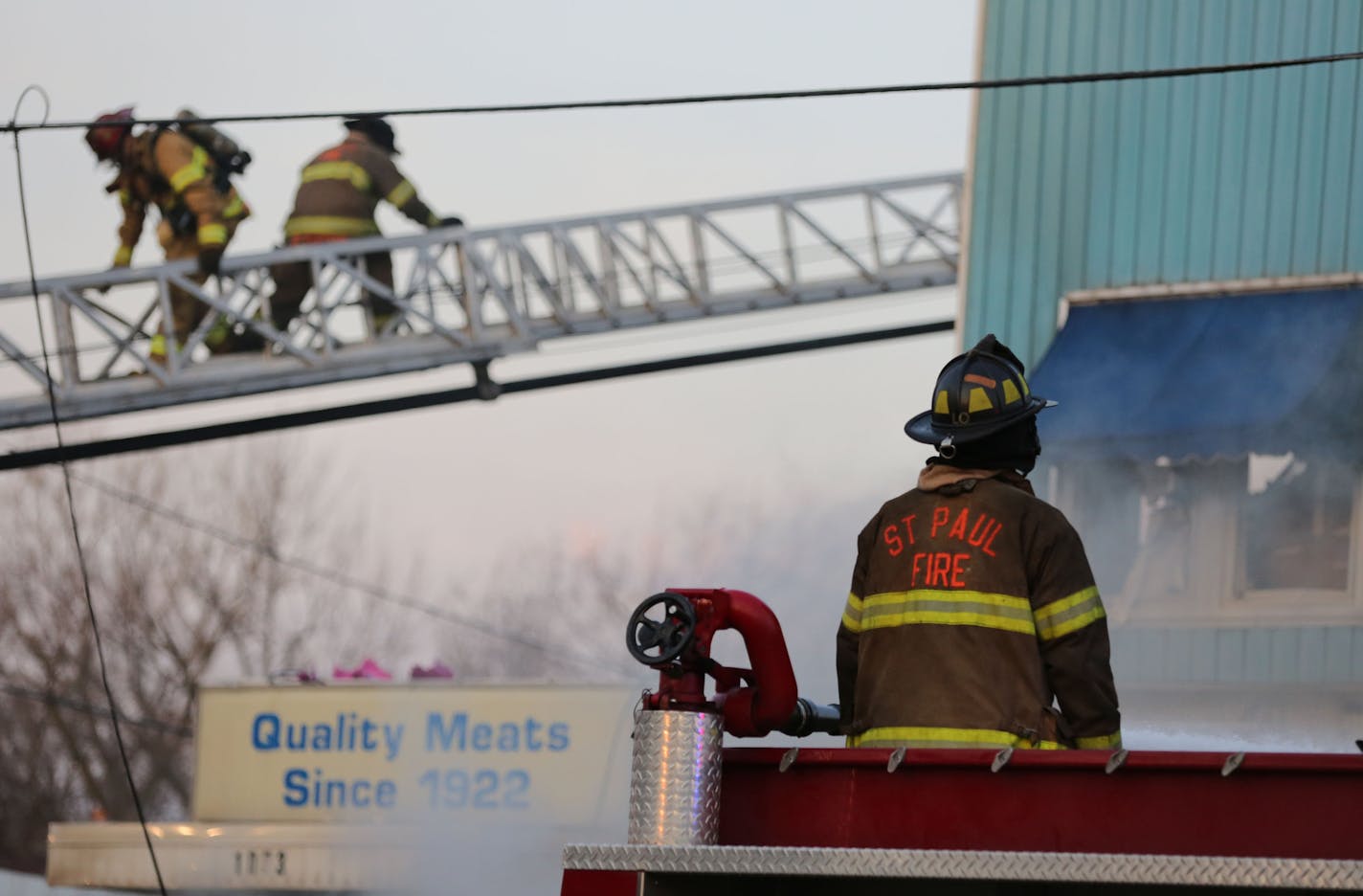 An early morning fire at Stasny's Food Market claimed the life of one male employee Thursday, April 14, 2016, in St. Paul, MN. Here, firefighters battled the fire.](DAVID JOLES/STARTRIBUNE)djoles@startribune.com An early morning fire at Stasny's Food Market claimed the life of one male employee Thursday, April 14, 2016, in St. Paul, MN.**,cq