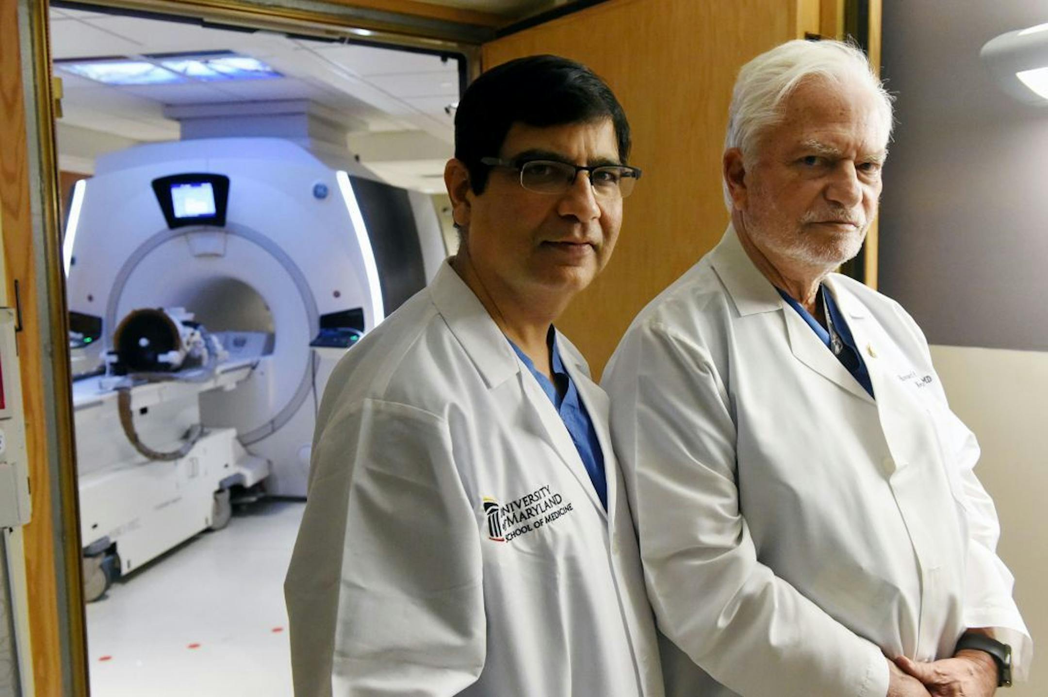 Drs. Dheeraj Gandhi, left, Chief of Interventional Neuroradiology, and Howard Eisenberg, Neurosurgery, University of Maryland Medical Center, are using targeted ultrasound to treat neuropathic pain in a clinical trial.