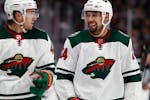 In the 22 games leading up to the March 12 stoppage, Wild defenseman Matt Dumba (right, with center Victor Rask) had 11 points and was more sound in h