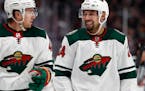 In the 22 games leading up to the March 12 stoppage, Wild defenseman Matt Dumba (right, with center Victor Rask) had 11 points and was more sound in h