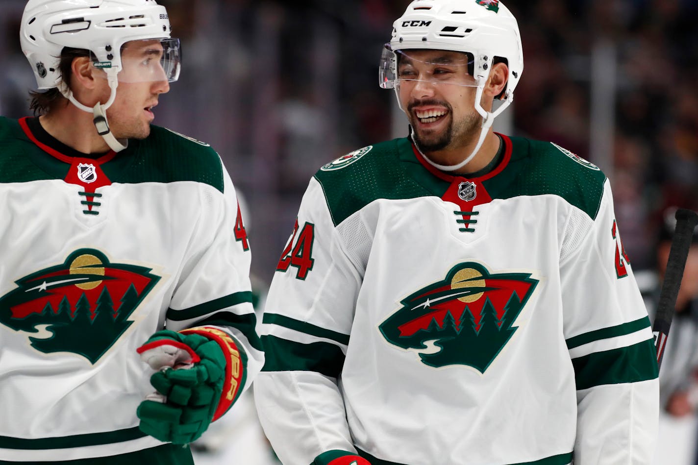 In the 22 games leading up to the March 12 stoppage, Wild defenseman Matt Dumba (right, with center Victor Rask) had 11 points and was more sound in his own end.