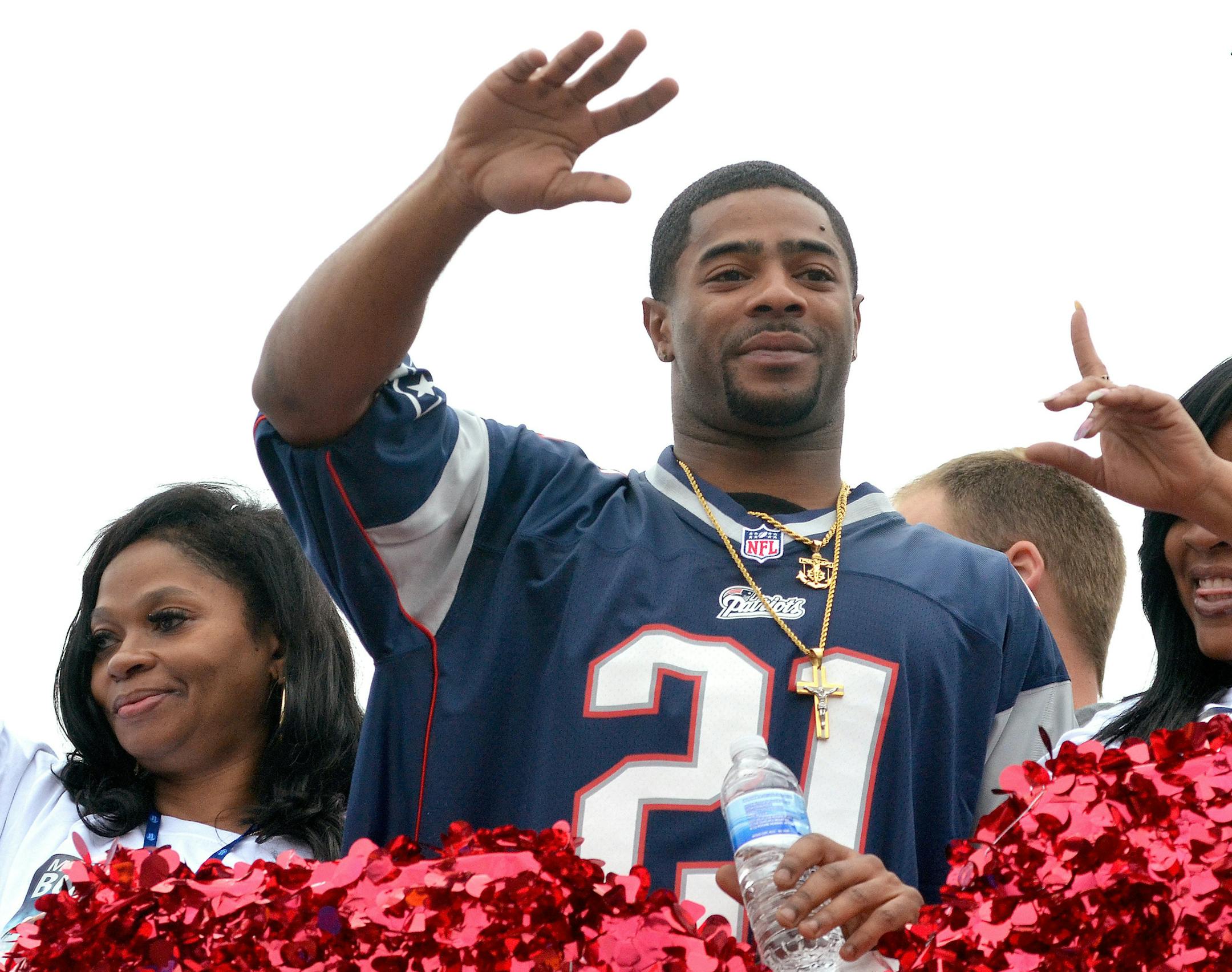 New England Patriots football player Malcolm Butler waves to fans during a parade in his honor Saturday, Feb. 21, 2015, in downtown Vicksburg, Miss. The parade included 70 floats, marching bands and two people in chicken costumes dancing alongside a Popeyes truck float. The 24-year-old Butler had the winning, goal-line interception in the final minute for the New England Patriots in their Super Bowl victory over the Seattle Seahawks on Feb. 1. (AP Photo/The Clarion-Ledger, Rick Guy)