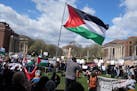 Gaza war protesters hold a rally on Northrop Plaza after the University of Minnesota's campus police cleared a pro-Palestinian encampment.