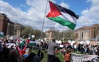 Gaza war protesters hold a rally on Northrop Plaza after the University of Minnesota's campus police cleared a pro-Palestinian encampment.