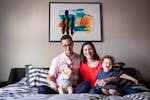 Greg and Kate Sicher want to make their Minneapolis home “our place as opposed to a place with furniture.” They're shown with children Lewis and E
