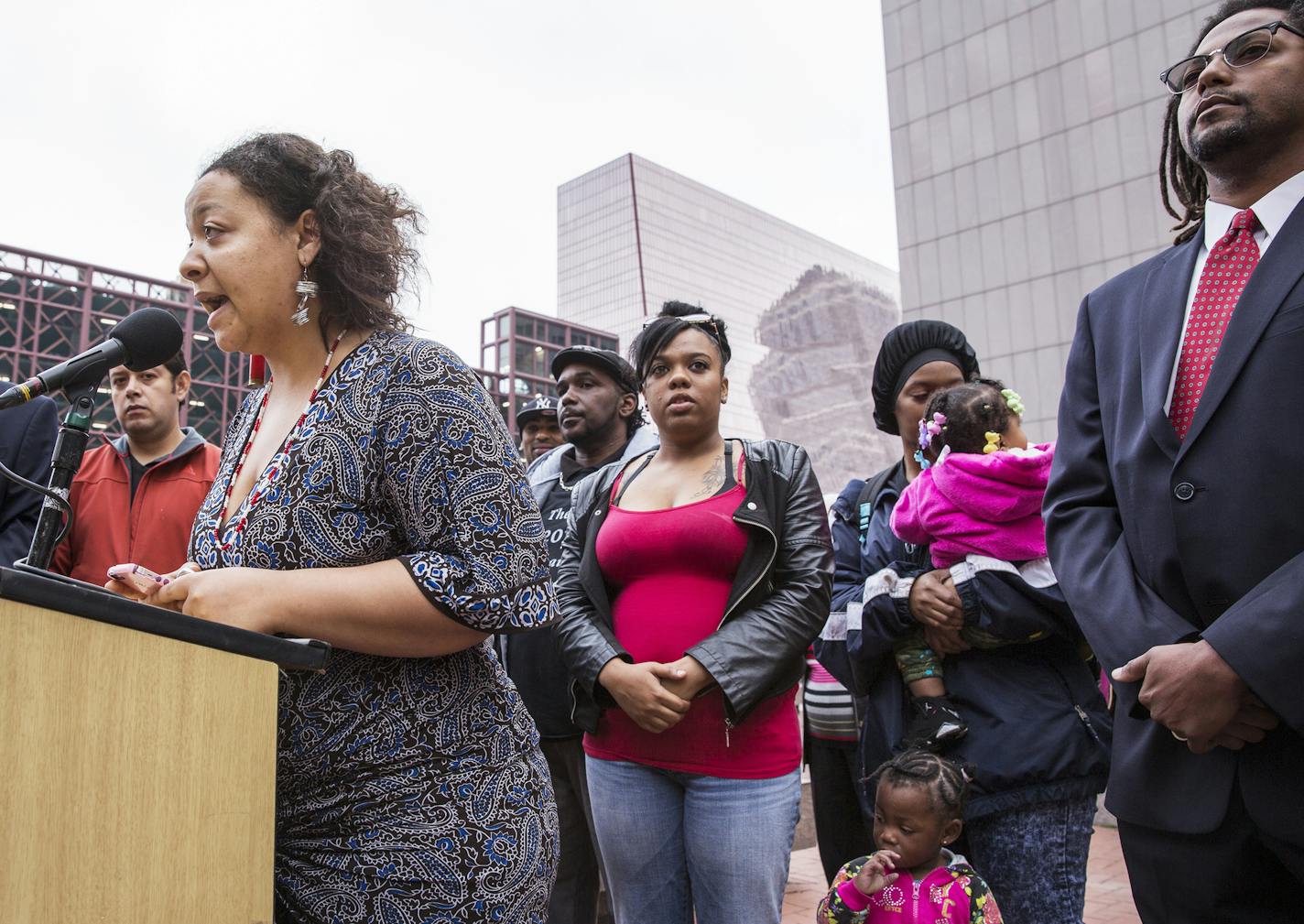 Plaintiff Roxxanne O'Brien speaks during a press conference announcing a lawsuit against the state of Minnesota for allowing segregation in schools outside the Hennepin County Courthouse in downtown Minneapolis on Thursday, November 5, 2015. ] (LEILA NAVIDI/STAR TRIBUNE) leila.navidi@startribune.com BACKGROUND INFORMATION: Seven families are suing the state of Minnesota for allowing segregation of public schools and depriving families of an equitable education.