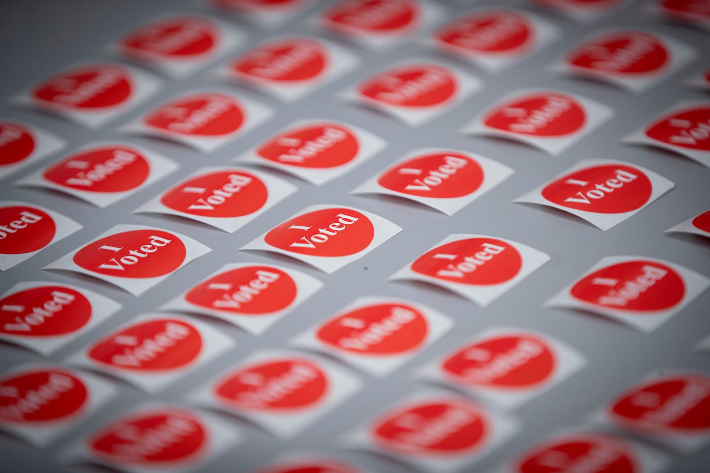 Red "I Voted" stickers flooded a table for voters after votes were cast in Mendota Heights in 2018.