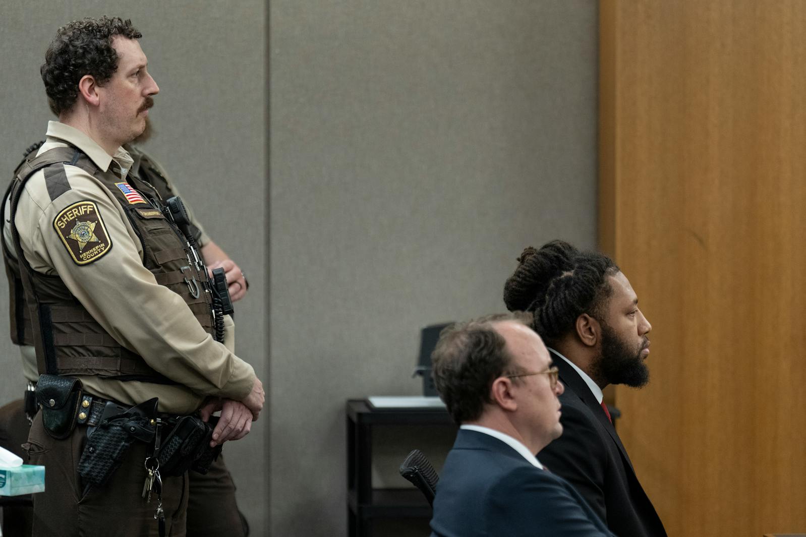 Derrick Thompson sits in court after being pronounced guilty on all counts on Friday.