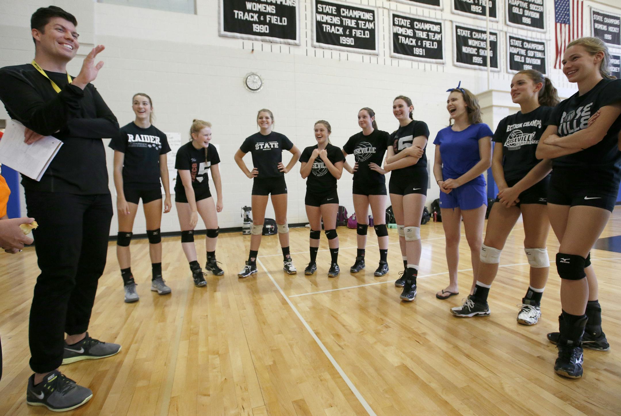 Roseville High School head volleyball coach Greg Ueland spoke with his team during practice on Monday. ] CARLOS GONZALEZ cgonzalez@startribune.com - September 21, 2015, Roseville, MN, Roseville High School Prep Volleyball,
