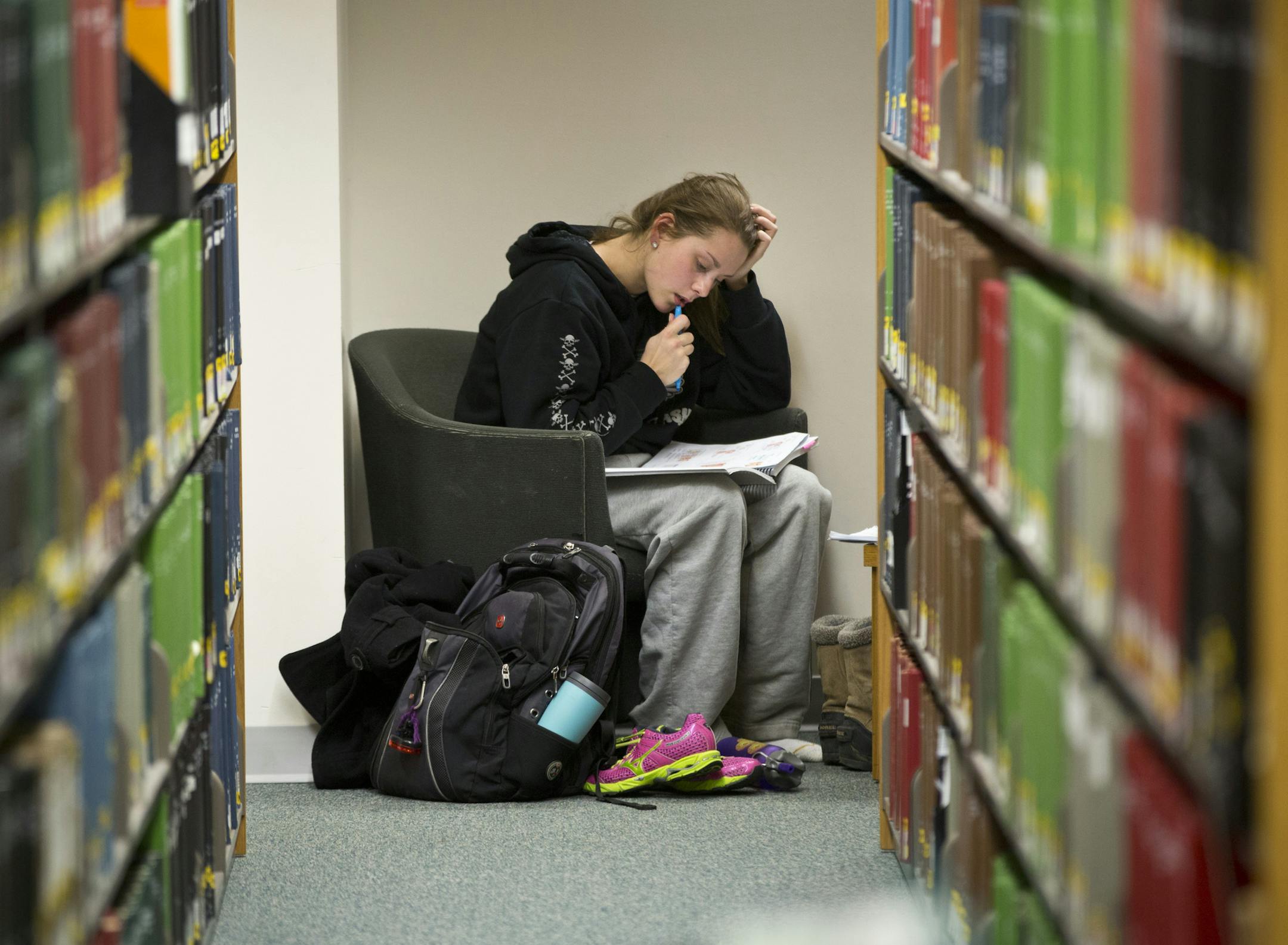 Junior Jennifer Nankivil studeied for an anatomy test at Walter Library at the University of Minnesota in Minneapolis, Minn., on Thursday, December 12, 2013. Ten years ago, less than a third of the students at the U of M graduated in four years -one of the poorest rates in the Big Ten. Since then, the graduation rate has nearly doubled - putting the U within "striking distance" of the 60% goal set by the Board of Regents. ] RENEE JONES SCHNEIDER &#x2022; reneejones@startribune.com