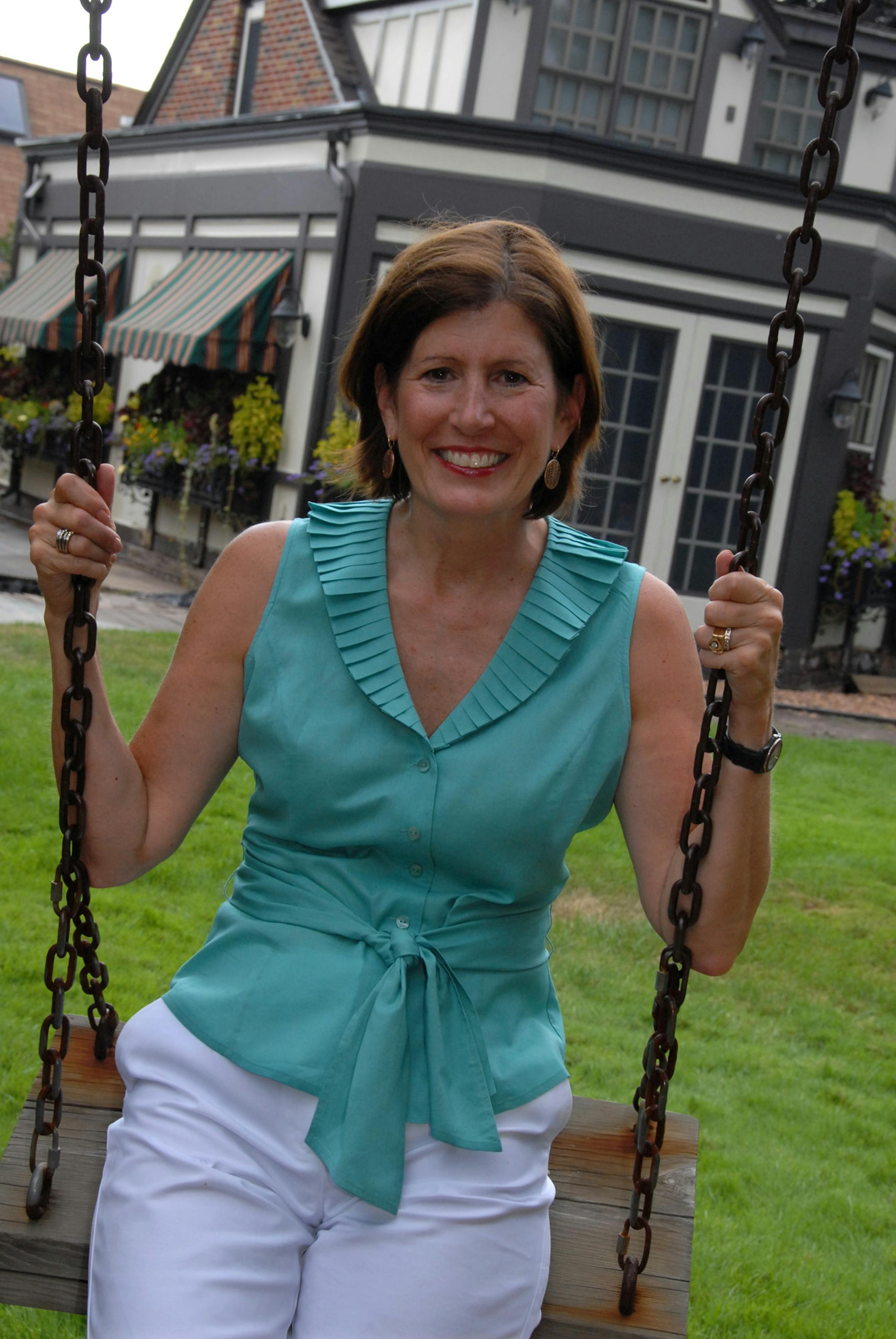 Martha Olson sat in the swing in her backyard.