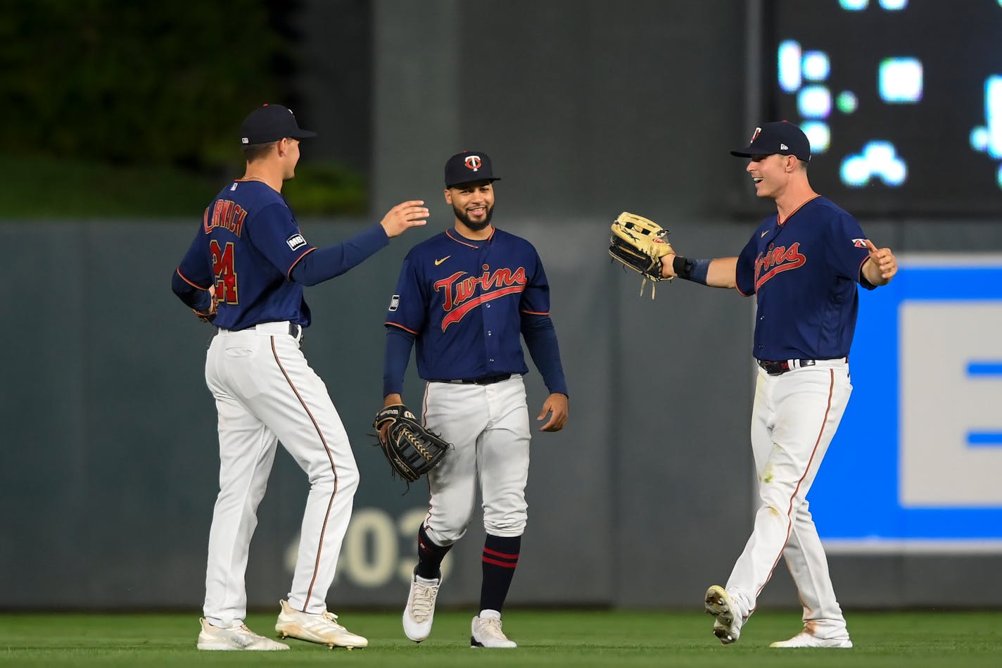 From left, Trevor Larnach (24), Gilberto Celestino (79) and Max Kepler (26) celebrated The Twins' 5-3 win against Detroit, the first of right in a row between the teams.