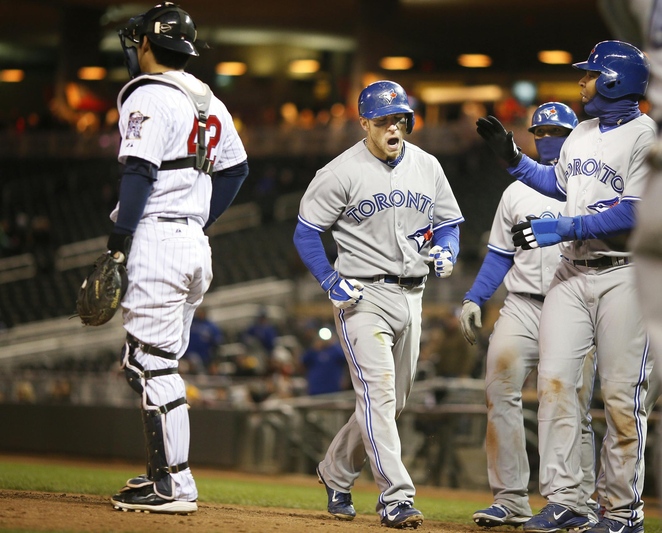 Toronto's Brett Lawrie celebrated his grand slam with teammates in the ninth inning during MLB action at Target Field between the Minnesota Twins and Toronto Blue Jays April 15, 2014 in Minneapolis , MN. Toronto beat Minnesota 9-3. ]JERRY HOLT jerry.holt@startribune.com