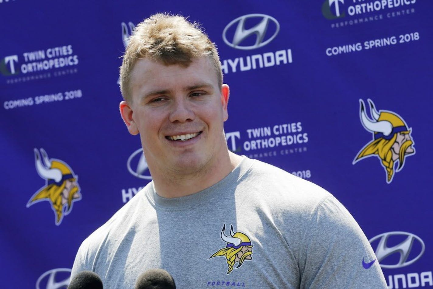 Minnesota Vikings rookie center Pat Elflein, out of Ohio State, takes questions from the media during the NFL football team's rookies minicamp Friday, May 5, 2017, in Eden Prairie, Minn.