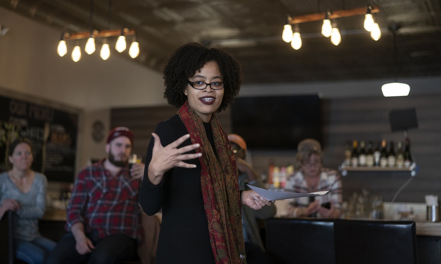 Sagirah Shahid read poetry at Sisters' Sludge Cafe during an event hosted by the Standish-Ericsson Neighborhood Association.