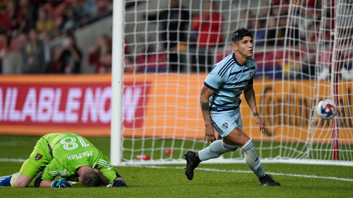 Real Salt Lake goalkeeper Zac MacMath (18) looks down after Sporting Kansas City forward Alán Pulido scored during the second half of an MLS soccer match Saturday, Oct. 7, 2023, in Sandy, Utah. (AP Photo/Rick Bowmer)