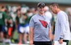 Coon Rapids head football coach Greg Malling left and Mounds View head coach Jim Galvin talked at Mounds View high school Wednesday June 29, 2016 in A