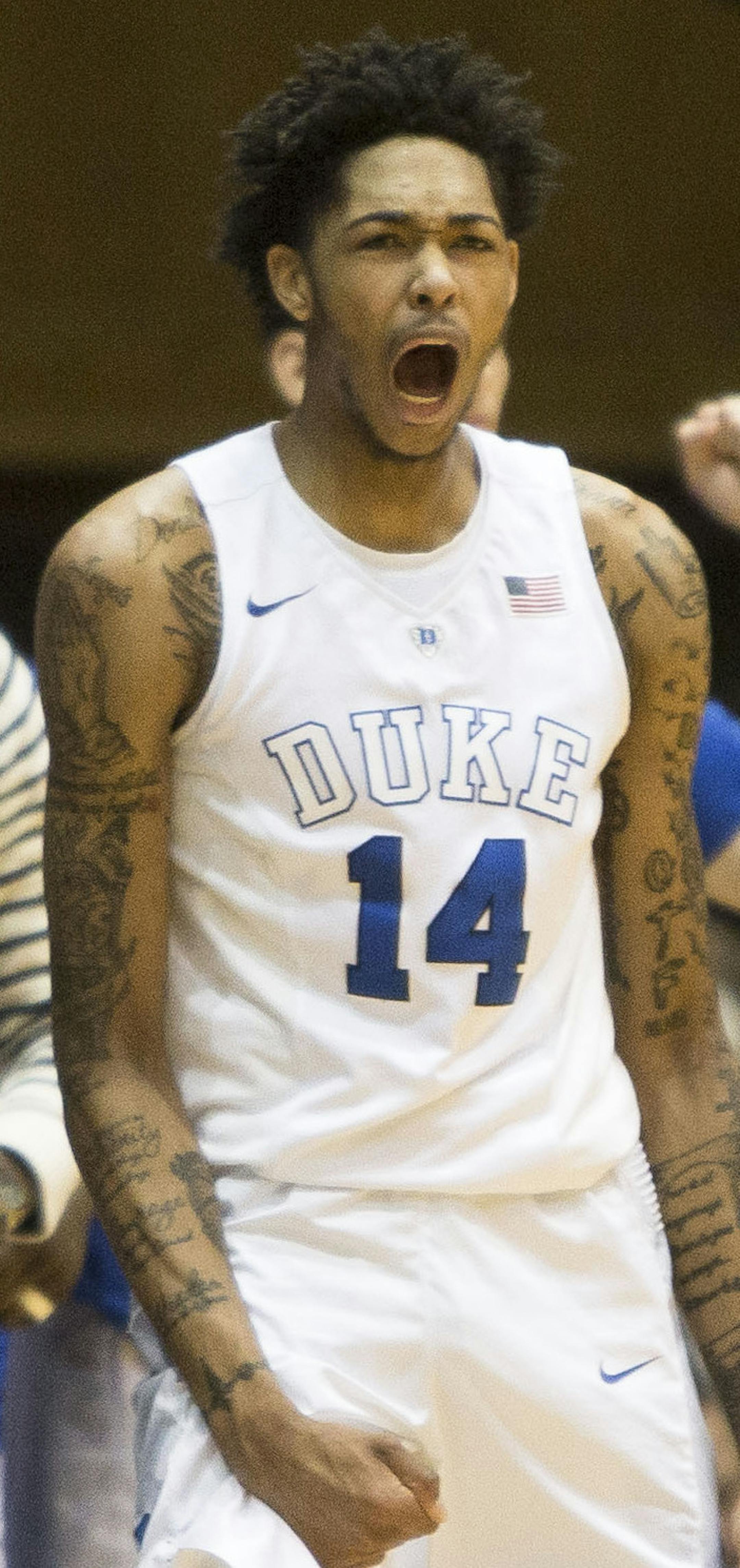 Dukeís Brandon Ingram (14), Chase Jeter (2), assistant coach Nate James, left, and coach Mike Krzyzewski, second from left, react to a play during the first half of an NCAA college basketball game against Wake Forest in Durham, N.C., Tuesday, March 1, 2016. (AP Photo/Ben McKeown)