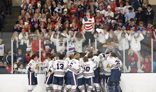 Orono celebrates winning the Class 1A, Section 2 title with their student section. Photo by Cheryl A. Myers, SportsEngine