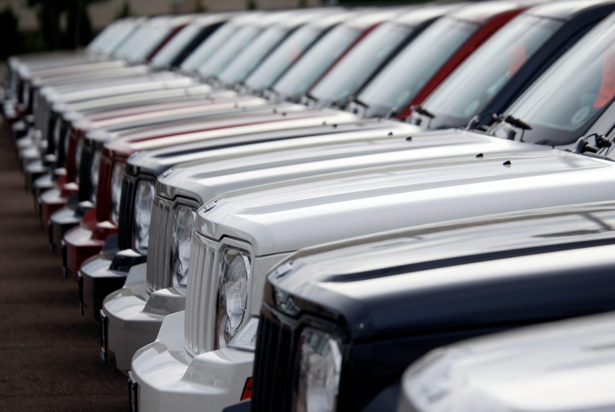 In this June 22, 2008 file photo, unsold 2008 Liberty sports-utility vehicles sit at a Chrysler-Jeep dealership in the southeast Denver suburb of Centennial, Colo. A shakeout in the auto leasing industry that revved up with Chrysler's exit from the leasing business last week is expected to be felt quickly by consumers who enjoy switching vehicles every two or three years without down payments or other ownership obligations.