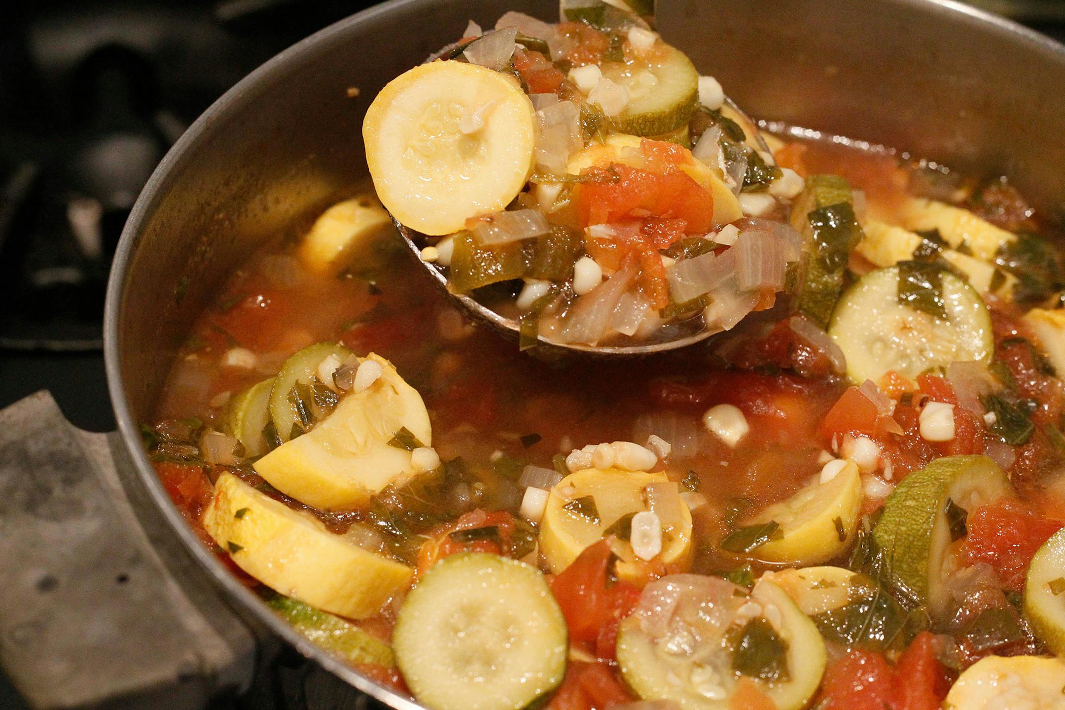 SH13H069CORNTOMATOESZUCCHINI Aug. 12, 2013 -- Soup with corn, tomatoes, and zucchini. (SHNS photo by Amy E. Voigt / The Toledo Blade) (Newscom TagID: shnsphotos147358.jpg) [Photo via Newscom] ORG XMIT: FUD COTOZU25P
