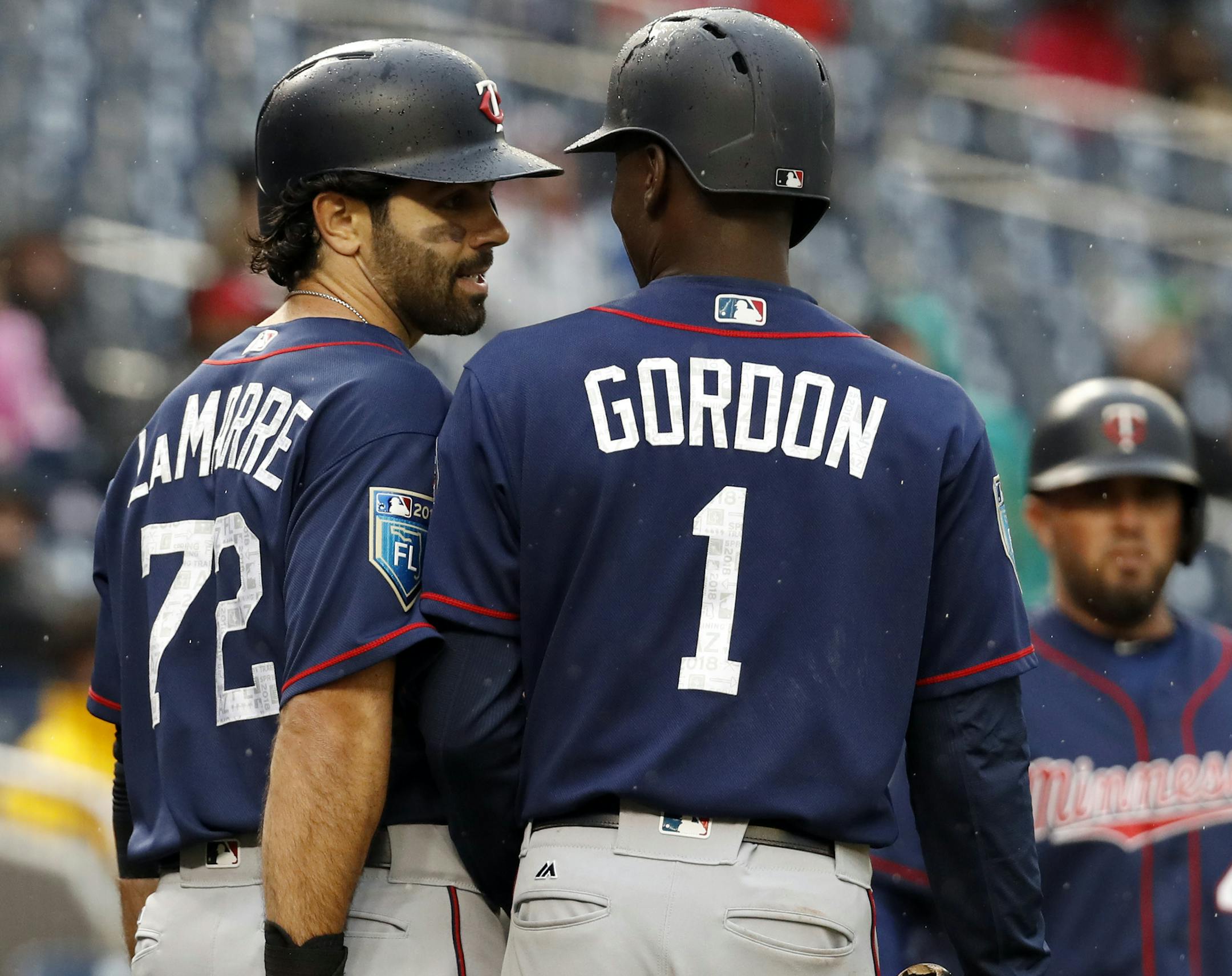 Ryan LaMarre had quite a Tuesday. He first was part of the Twins' ninth-inning rally in beating Washington 3-1, then found out he'd made the roster.