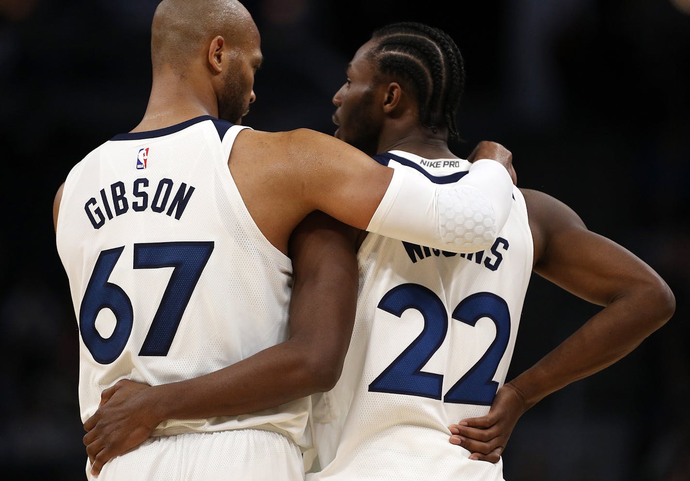 Minnesota Timberwolves forward Taj Gibson (67) and Minnesota Timberwolves forward Andrew Wiggins (22) shared a moment together in the second half. ] ANTHONY SOUFFLE &#xef; anthony.souffle@startribune.com Game action from an NBA game between the Minnesota Timberwolves and the Dallas Mavericks Saturday, Nov. 4, 2017 at the Target Center in Minneapolis.