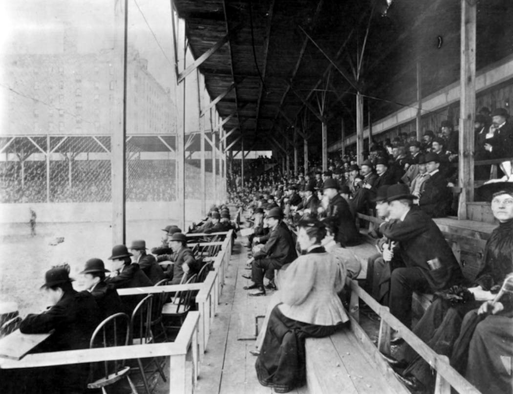 Spectators watch a baseball game at Athletic Park in downtown Minneapolis in the mid-1890s.