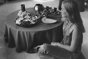 Fondue was all the rage in the 1970s, as were low tables.