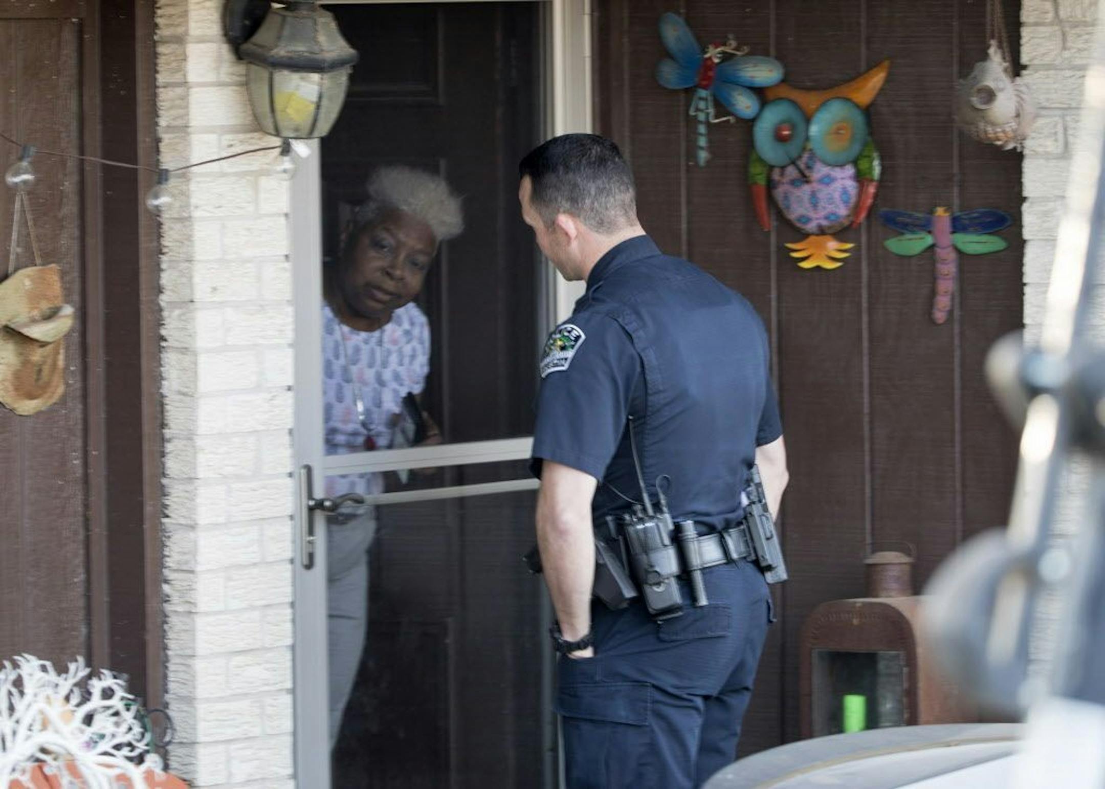 Authorities are investigating the scene in East Austin, Texas, after a teenager was killed and a woman was injured in the second Austin package explosion in the past two weeks Monday, March 12, 2018. Authorities say a package that exploded inside of an Austin home on Monday is believed to be linked to a deadly package sent to another home in Texas' capital city earlier this month.