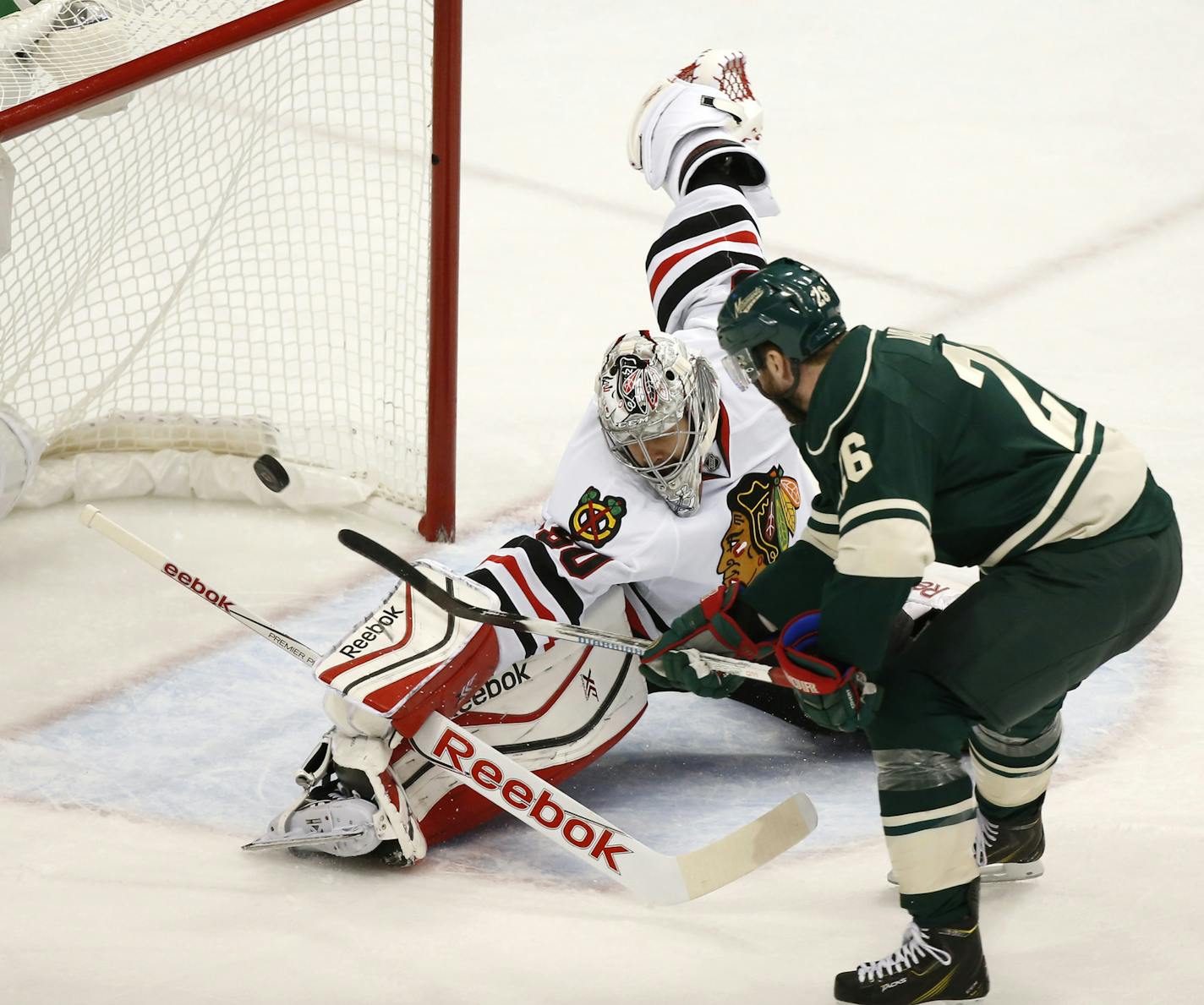 Chicago Blackhawks goalie Corey Crawford (50) blocked a shot by Minnesota Wild left wing Thomas Vanek (26) in the second period. ] CARLOS GONZALEZ cgonzalez@startribune.com, May 7, 2015, St. Paul, MN, Xcel Energy Center, NHL, Minnesota Wild vs. Chicago Blackhawks, Game 4, Stanley Cup Playoffs, Round 2