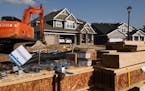 Building materials for a home under construction sat near several already inhabited homes in Inver Grove Heights last year.