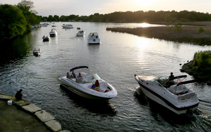 Boat traffic was heavy on Lake Minnetonka as daylight faded Friday, May 22, 2015, near Lord Fletcher's in Spring Park, MN.](DAVID JOLES/STARTRIBUNE)djoles@startribune.com As boaters flock to Minnesota lakes and rivers this holiday weekend for the unofficial kick-off to the boating season, they'll face more inspections in and out of the water as local cities and counties ramp up their work to stop the spread of invasive species. Across the metro, more boat accesses will be staffed by watercraft inspectors thanks to $10 million funneled to county government programs this year, up from $4.5 million the state allocated last year. ORG XMIT: MIN1505222156290209 ORG XMIT: MIN1506021218440580